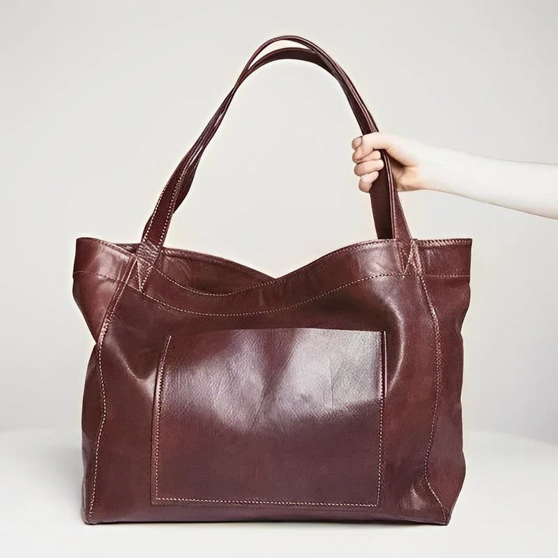Curved Underarm Hobo Handbag with Minimalist Shoulder Strap and Polished Finish