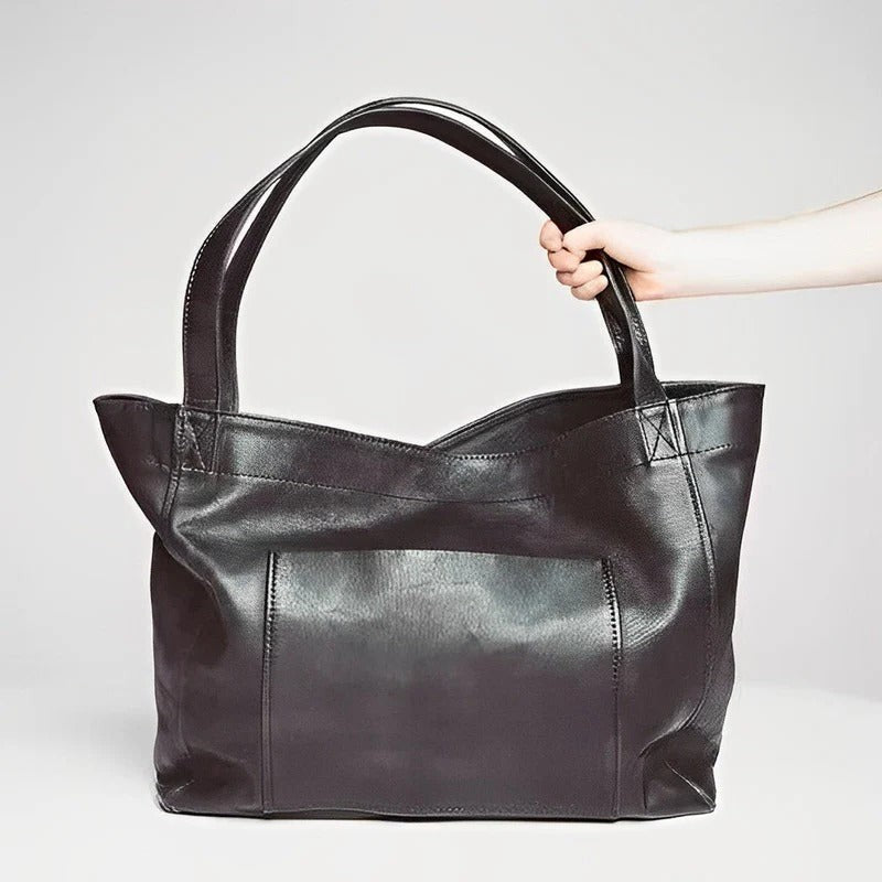 Curved Underarm Hobo Handbag with Minimalist Shoulder Strap and Polished Finish