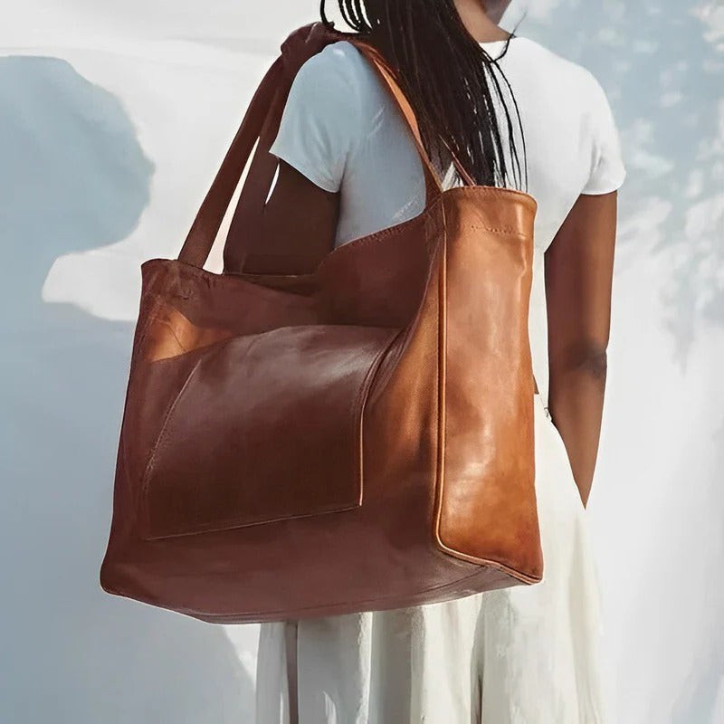 Curved Underarm Hobo Handbag with Minimalist Shoulder Strap and Polished Finish