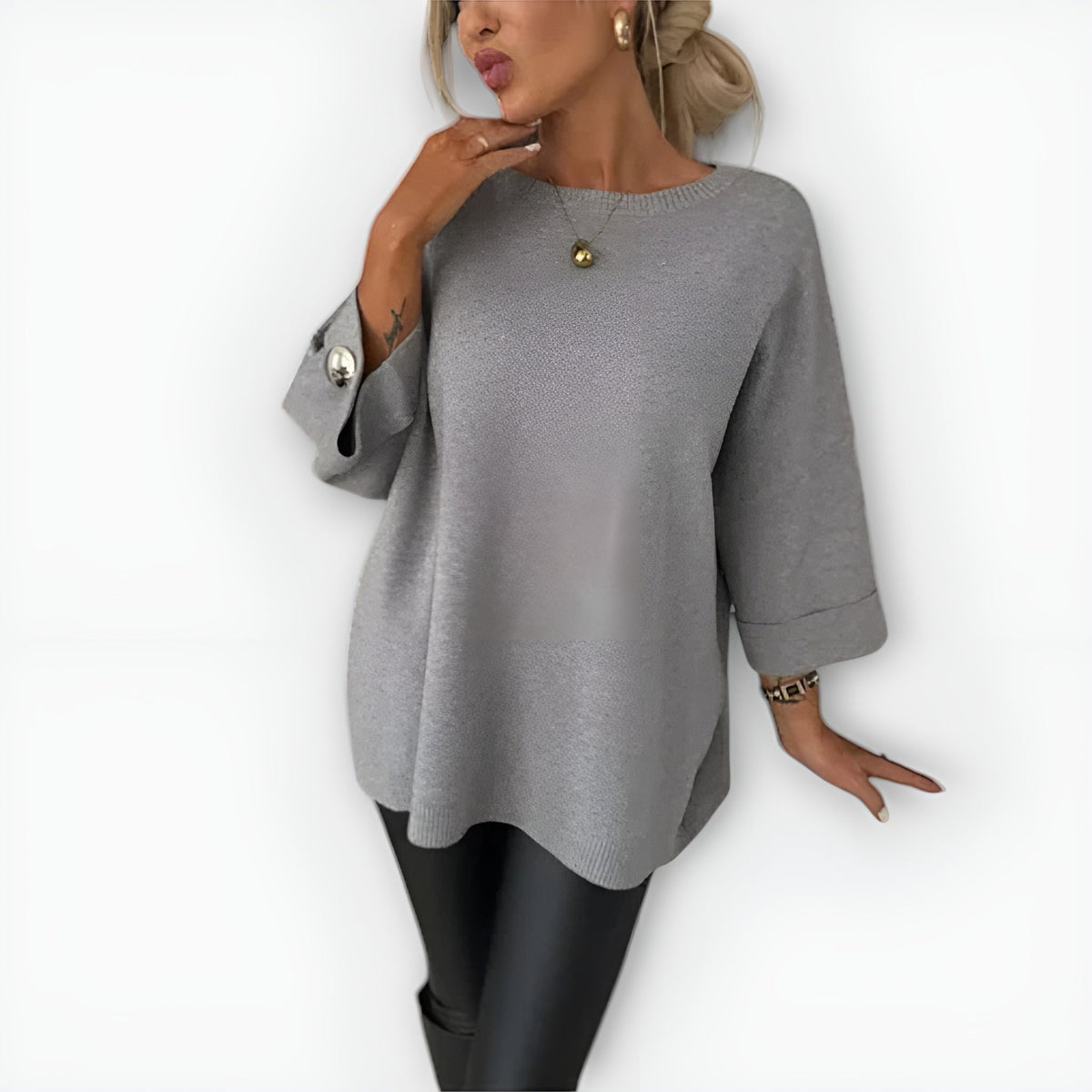 Oversized Round Neck Sweater with Three Quarter Sleeves and Button Cuffs