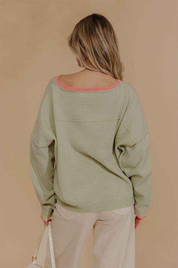 Relaxed Fit Knit Top with Coral Trim and Visible Seam Details