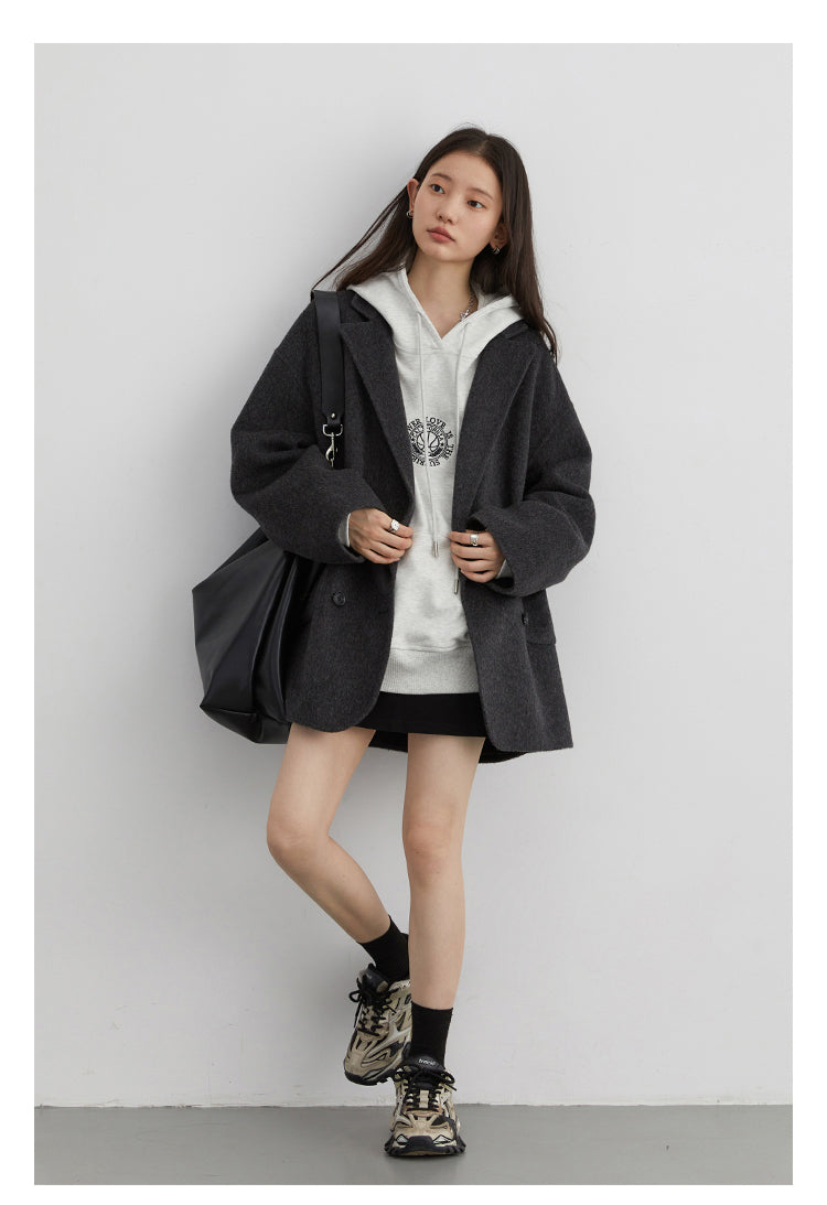 Double Breasted Polyester Coat with Loose Draping Silhouette and Double Sided Construction for Women