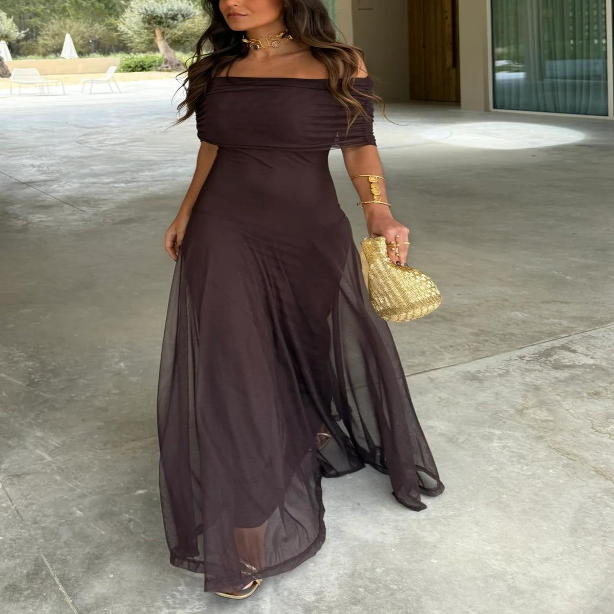 Romantic flowy brown off-shoulder maxi dress, ideal for summer garden parties & elegant outdoor events.