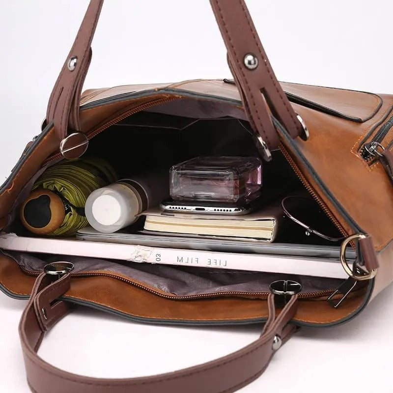 Organized Handbag with Internal Dividers and Adjustable Shoulder Strap