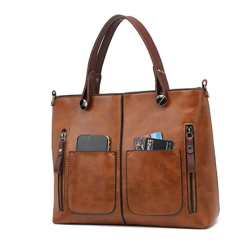 Organized Handbag with Internal Dividers and Adjustable Shoulder Strap