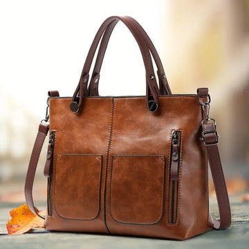 Organized Handbag with Internal Dividers and Adjustable Shoulder Strap