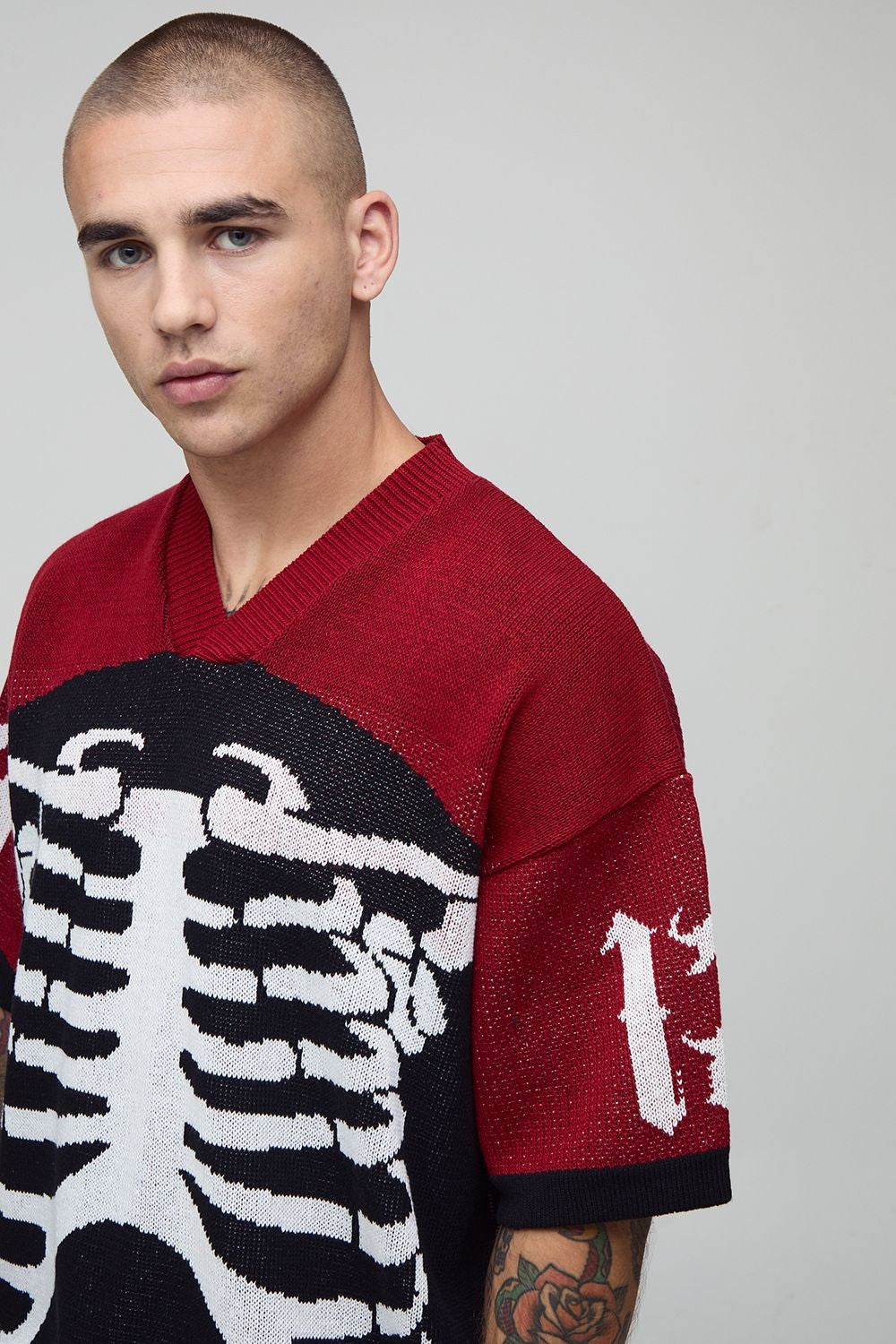 Red Skeleton Jacquard Knit Top with V Neckline and Ribbed Sleeve Trim