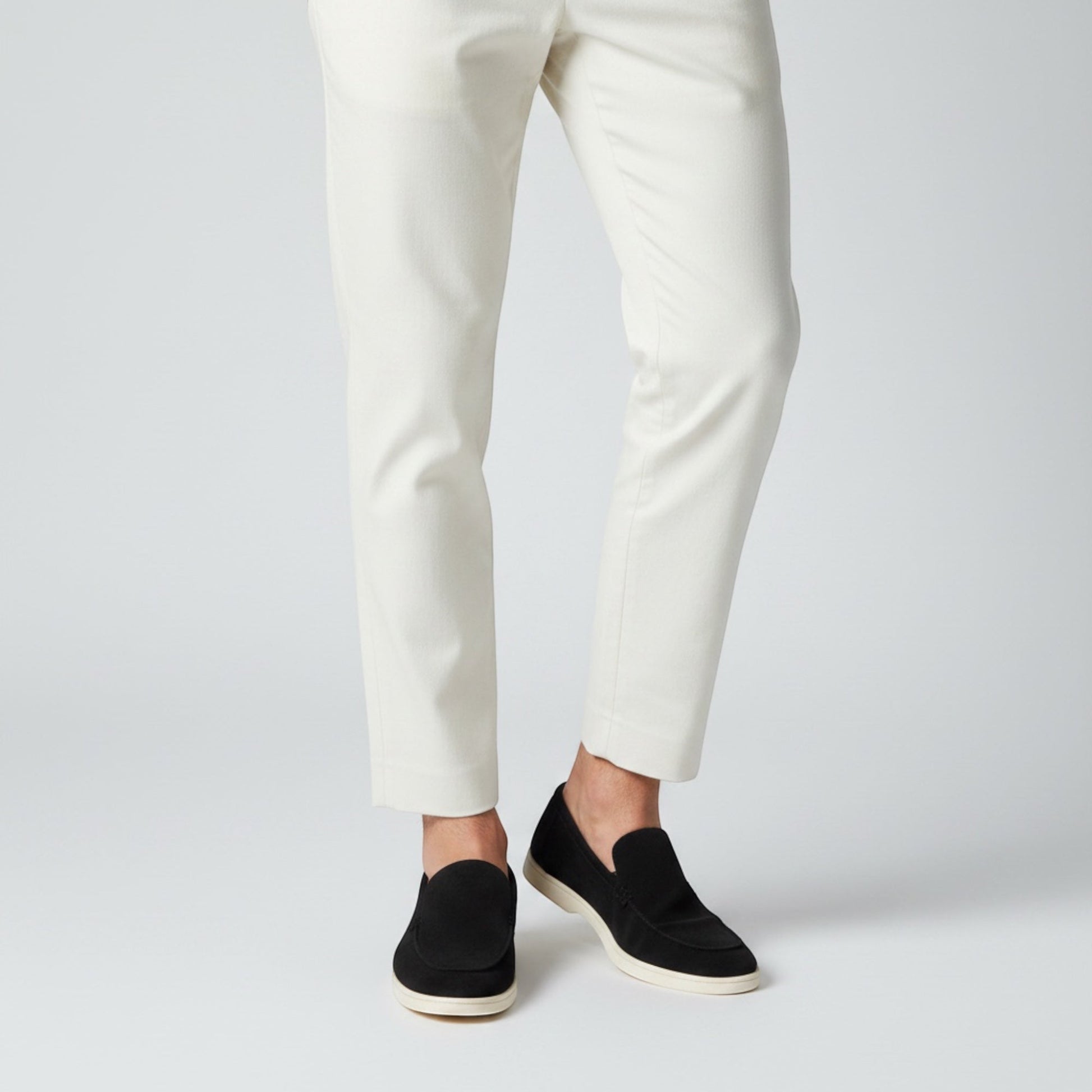 Modern men's slip-on loafers, stylish summer footwear for a sophisticated casual or smart-casual look.