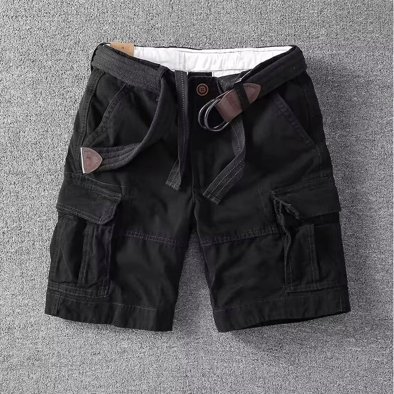 Green men's utility shorts with straight leg cut, multiple pockets, and an adjustable waist for comfort.