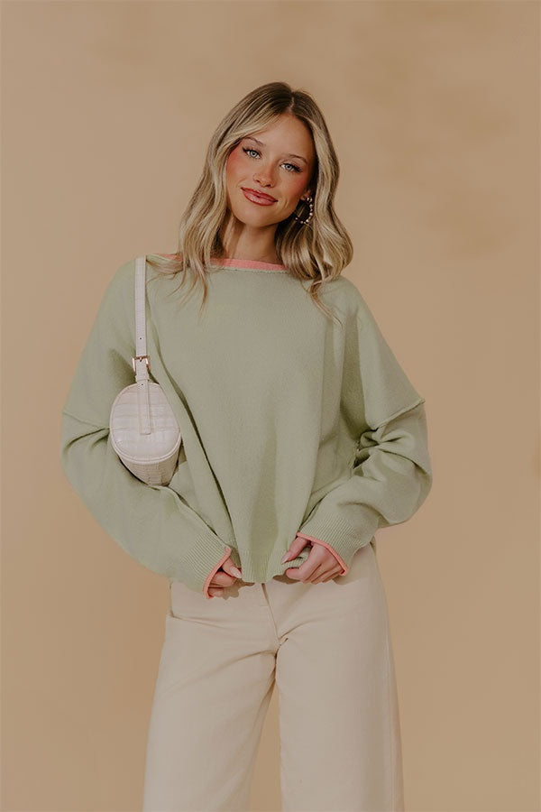 Relaxed Fit Knit Top with Coral Trim and Visible Seam Details