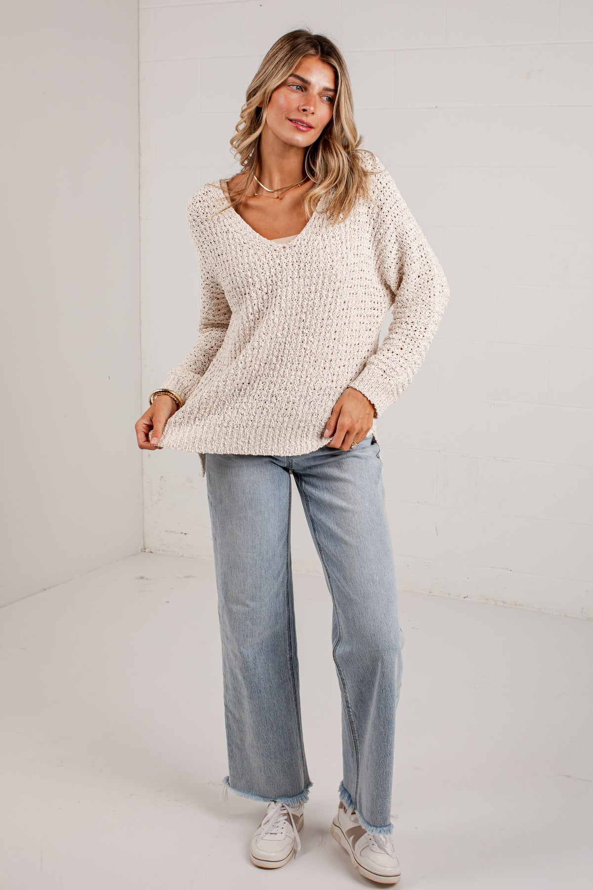 Ivory Knit Sweater with Cuffed Long Sleeves and Split Hem, Relaxed Fit