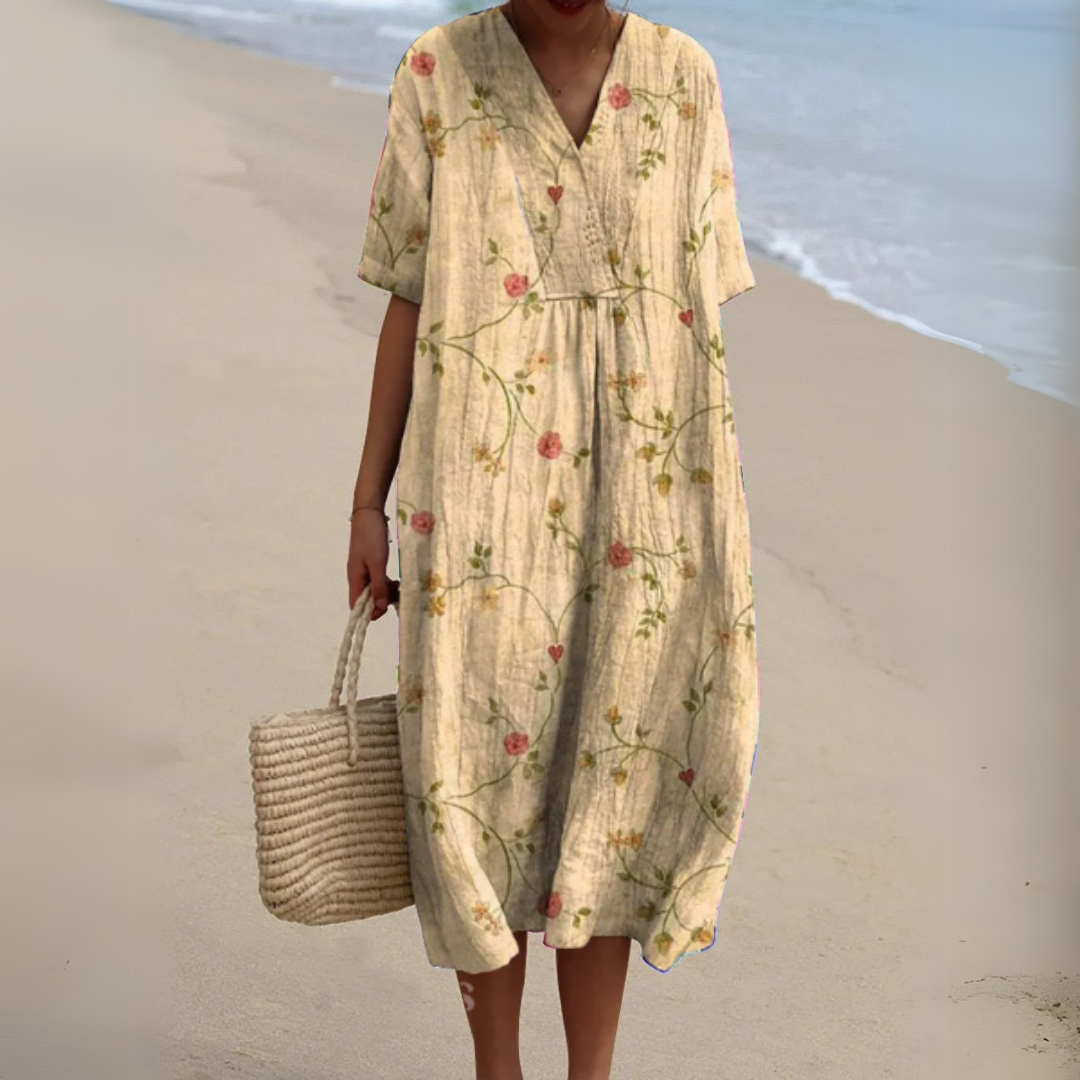 Side view of a casual women's multicolour floral V-neck dress, perfect for warm weather.