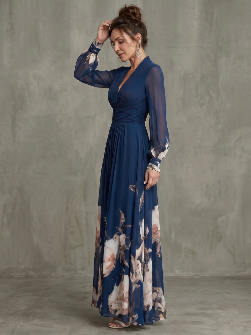 Women's navy pleated maxi dress with elegant sheer long sleeves & V-neck, perfect for evening or formal events.