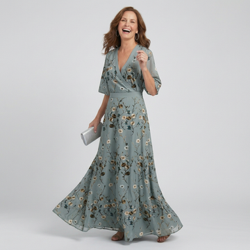 Women's sage green floral halter maxi dress, flowy and relaxed for summer vacation style.
