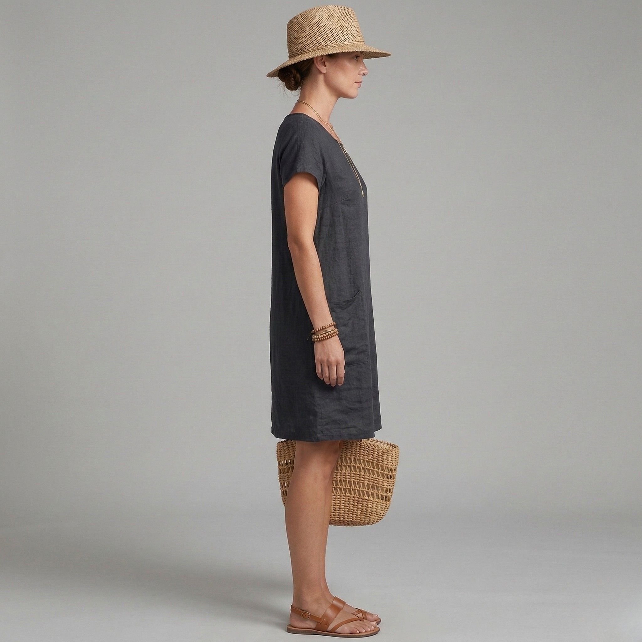 Everyday women's mini dress, short-sleeved with practical front pockets. A comfortable and stylish shift dress for summer.